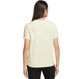 Remera color amarillo claro de corte clásico con logo Nike bordado en el pecho.