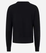 Suéter boxy color marrón, de punto leve, con cuello redondo y mangas largas con puños y bajo acanalados.