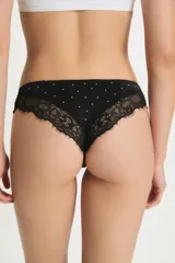 Culotte negro con lunares blancos y encaje floral en los laterales.