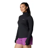 Remera deportiva Columbia negra de manga larga con medio cierre frontal y tecnología Omni-Wick para control de la humedad y neutralización de olores.