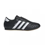 Zapatillas Adidas de taekwondo, color negro con las tres tiras blancas y detalles en blanco en el talón.