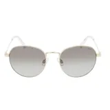 Lentes de sol INVU con montura metálica dorada de forma redonda y lentes grises degradadas.