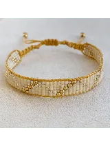 Pulsera tejida con cuentas MIYUKI en tonos de beige, dorado y plateado.