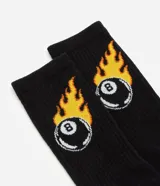 Par de medias negras de caña alta con estampa de bola 8 en llamas.
