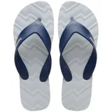Ojotas Havaianas Track Waves, base blanca con textura y tiras azul marino con logo de la marca en blanco.