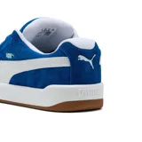 Championes Puma Park Easy SD de gamuza azul con detalles en blanco y suela de goma marrón.