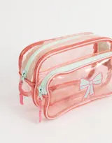 Cartuchera de PVC transparente con doble compartimento con cierre y diseño de moño en relieve.