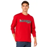 Remera de manga larga roja con el logo de Lacoste estampado en el pecho.