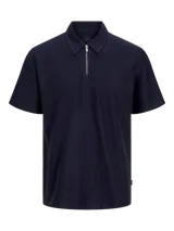 Polo azul marino de algodón con cierre de cremallera y calce regular.