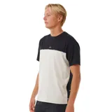 Remera de mangas cortas con diseño de bloques de color negro en la parte superior y beige en la parte inferior.