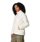 Campera polar Columbia color crema, con cierre frontal completo, cuello alto, bolsillos laterales y bolsillo en el pecho con cierre de velcro.