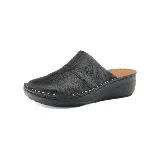 Zueco negro de cuero con plantilla anatómica y suela de goma.