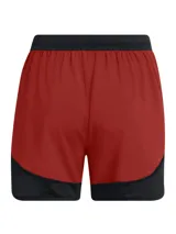 Short deportivo Under Armour Challenger Pro para mujer, color ladrillo con cintura y laterales negros. Logo de la marca en blanco en la pierna derecha.