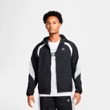 Campera Nike Air Woven negra con detalles en blanco, corte relaxed fit y capucha.