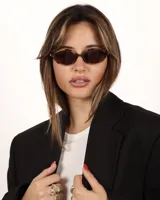 Lentes de sol con montura ovalada Carey y lentes marrones polarizadas con protección UV400.