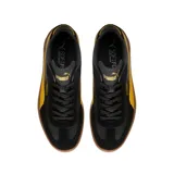 Championes Puma Club LI Era de cuero sintético negro con detalles en amarillo y suela color caramelo.
