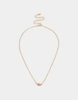 Collar de cadena corta dorada con dije de ojo con strass, con cierre de mosquetón.