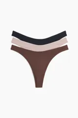 Pack de tres bombachas colaless de microfibra en colores negro, beige y marrón.