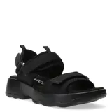 Sandalia de tela negra con velcros ajustables, diseñada para un calce cómodo y seguro.