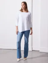 Blusa verde manzana en tejido acanalado, marca Ruby Rd, con mangas 3/4 con abertura y botones, y ruedo asimétrico.