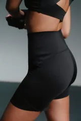 Calza biker deportiva negra de poliéster y elastano.