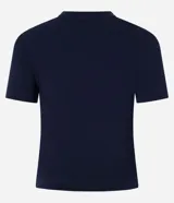 Remera baby look azul marino con estampado frontal de letras "USA" apiladas verticalmente sobre el número "20" y el número "08" separados por una estrella blanca.