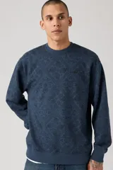 Sweater azul con estampado de cachemira en toda la prenda, cuello redondo y corte relajado.