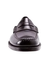 Zapato mocasín de cuero negro lustrado, con detalle de antifaz y costuras en la capellada. Suela con tecnología Bounce de doble densidad para mayor comodidad.