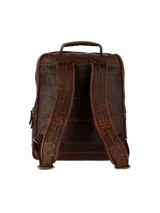 Mochila marrón de cuero, con forro interior de poliéster reciclado, cierre de cremallera, bolsillos frontales con broche y cierre, compartimento acolchado para laptop de 15 pulgadas y bolsillo interior con cierre.