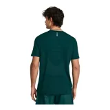 Remera deportiva gris jaspeado de corte clásico, con cuello redondo y mangas cortas. Confeccionada con tejido de punto transpirable y tecnología seamless para mayor comodidad.