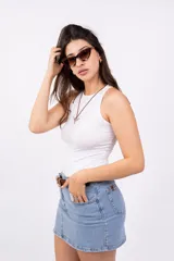 Body ajustado de lycra con estampado animal print de leopardo y cuello halter.