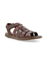 Sandalia romana de cuero, con tiras cruzadas y cierre de velcro, ideal para uso diario.