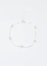 Pulsera de plata 925 con cadena forcet y perlas españolas de 4mm. Tiene un largo de 17cm + 3,5cm de extensión.