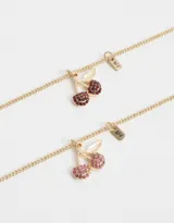 Set de dos collares dorados con dije de cerezas con strass rojos y rosas, y dije con la inscripción "BFF".