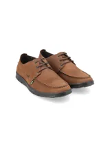 Zapato náutico casual de cuero azul marino con cordones, suela de goma color crema y plantilla calada.