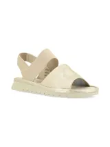 Sandalias bajas color dorado con dos tiras anchas, una sobre los dedos y otra elástica en el talón.