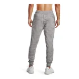 Pantalón de jogging gris jaspeado de Under Armour, modelo Rival Terry Jogger, para hombre. Confeccionado en tejido de felpa suave, con cintura elástica ajustable con cordón y logo de la marca estampado en la pierna izquierda.