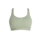 Top deportivo New Balance color verde claro, de soporte medio, confeccionado en tejido poly knit con tecnología NB DRY y copas removibles.