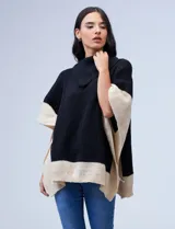 Poncho de tejido color negro y beige, con cuello volcado asimétrico, de marca Barrington.