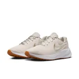 Championes de running Nike Revolution 7, color beige con logo dorado.