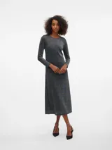 Vestido midi negro con brillos plateados, de manga larga y cuello redondo. Confeccionado en tejido de punto con forro de algodón.