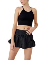 Short deportivo negro de tiro alto con cintura elástica y pliegues.