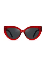 Gafas de sol con forma de ojo de gato, montura de acetato biodegradable color verde y lentes de PMMA reciclado color negro.