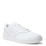 Championes urbanos New Balance de cuero blanco con logo "N" en relieve.