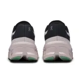 Championes de running On Cloudmonster, color lila con detalles en gris, negro, verde y rosa.