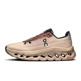 Championes de running color beige con detalles en marrón.
