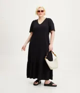 Vestido midi negro de algodón, con escote en V, mangas cortas abullonadas y falda con volantes.