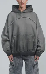 Canguro gris con capucha, de corte oversize y efecto desgastado.