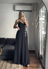 Pantalón palazzo marrón de crepé de lino, talle único adaptable hasta un talle 42 de jean. Presenta elástico en la parte trasera.