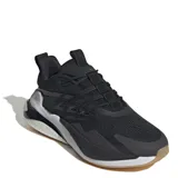 Championes deportivos de hombre en color negro y blanco, con diseño moderno y suela cushioned.
